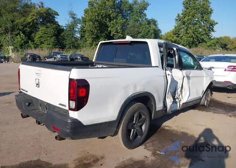 2021 Honda Ridgeline Rtl-E z USA, uszkodzony, nr VIN 5FPYK3F74MB019734